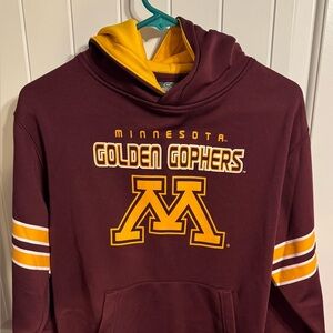 Colosseum Athletics Youth Maroon and Yellow Minnesota Gophers sweatshirt.